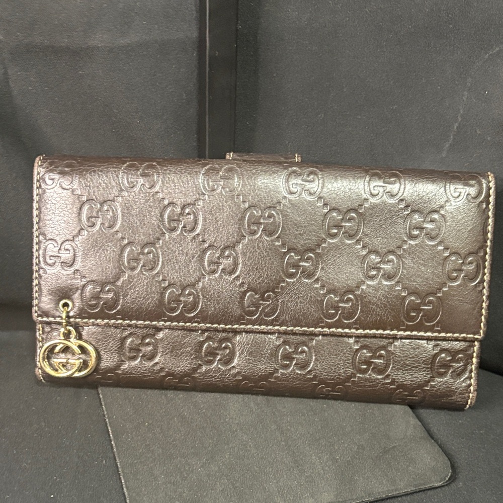 Gucci Dark Brown Embossed Leather Wallet